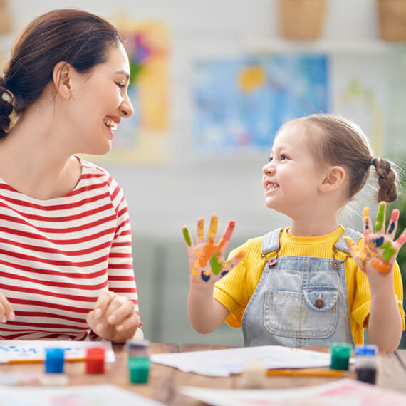 happy-family-painting-together-KNJ3UA8